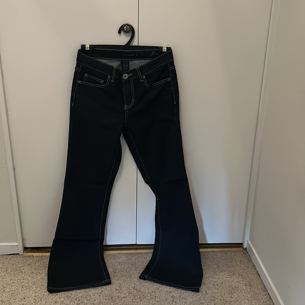 Beautiful dark wash Calvin Klein flare leg jeans. New: In mint condition.
